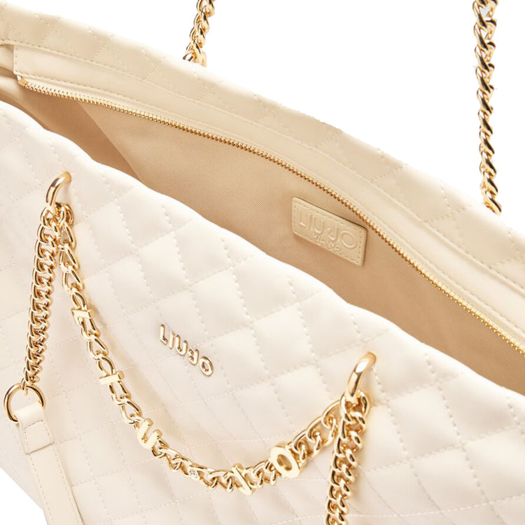 Borsa a spalla da donna beige matelassé con catena logata interno