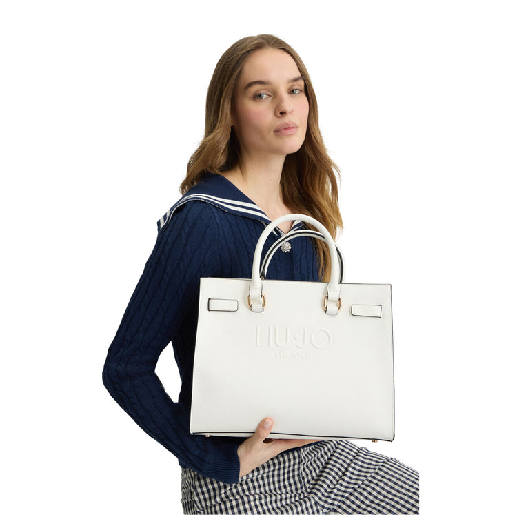 Borsa Shopping tinta unita bianca con logo modella