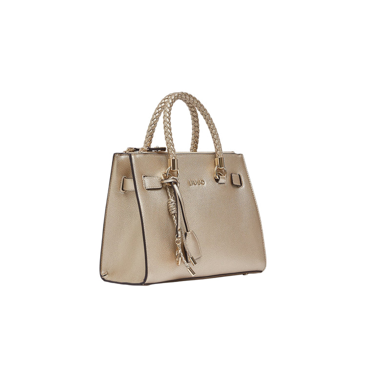 Borsa oro chiaro effetto tamburo