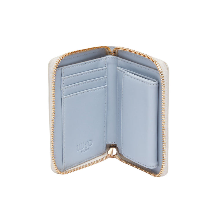 Portafoglio Donna Bianco compatto, dall'effetto bottalato, con interno a contrasto