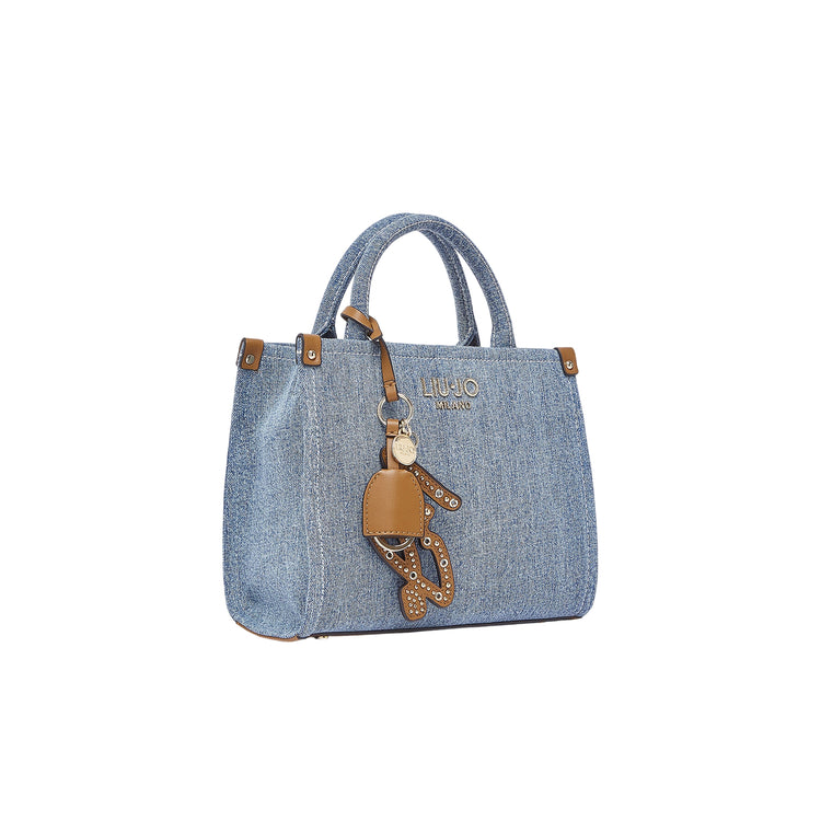 Borsa a mano in denim con charm