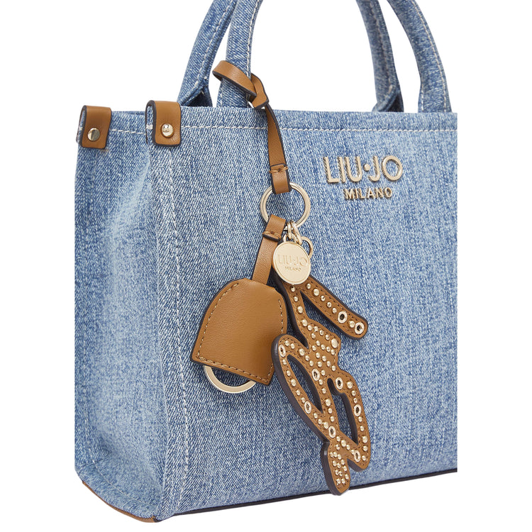 Borsa a mano in denim con charm