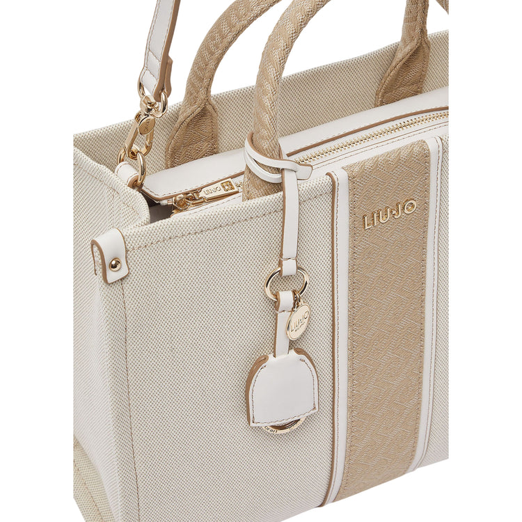 Borsa media a mano color crema e jacquard