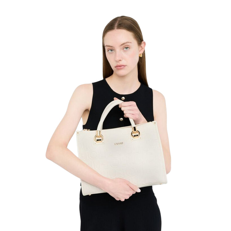 Borsa Donna satchel media con logo a rilievo all over su modella