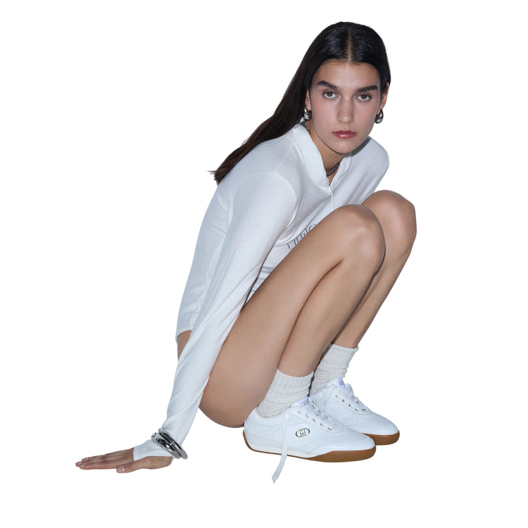 Sneakers Donna dettagli effetto pitone modella