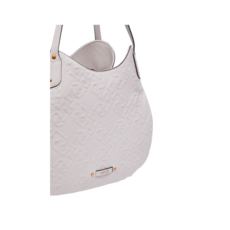 Women's bag with leather inserts and all-over logo