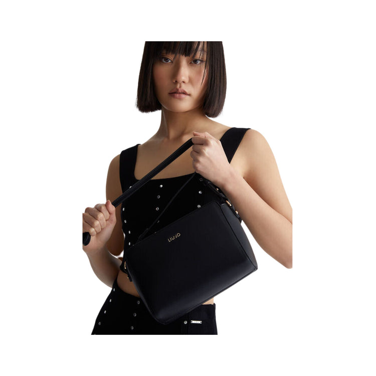 Small women's bag with shoulder strap