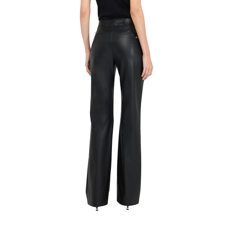 Pantaloni flare Donna in tessuto spalmato nero modella retro