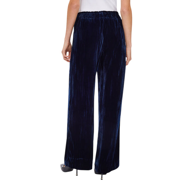 Pantaloni Donna in velluto Blu modella retro