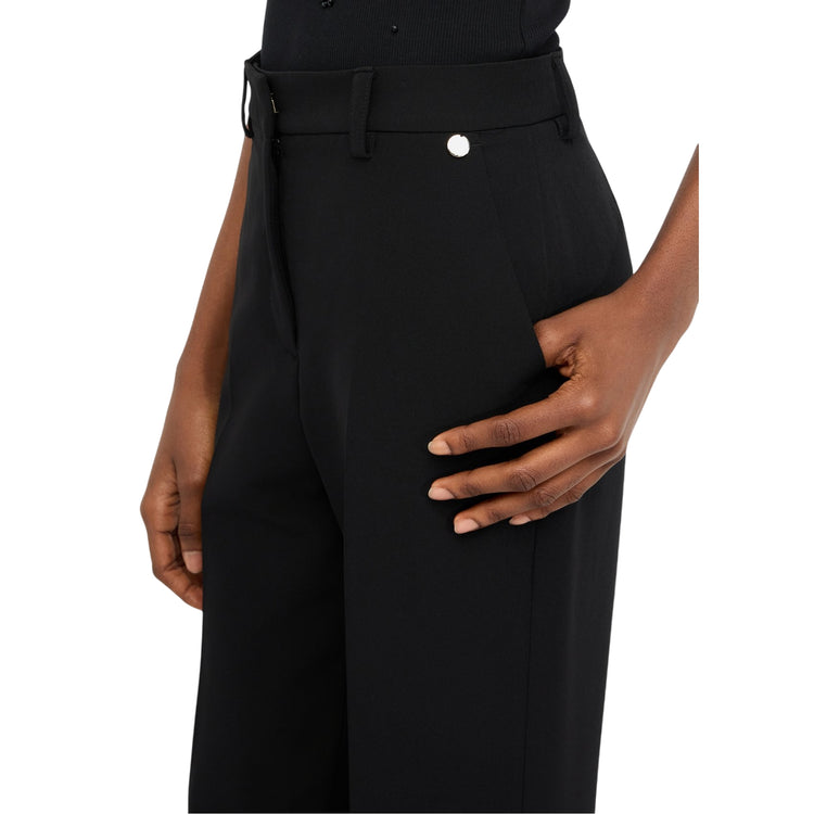 Pantalone Donna con tasche a filetto e logo metallico