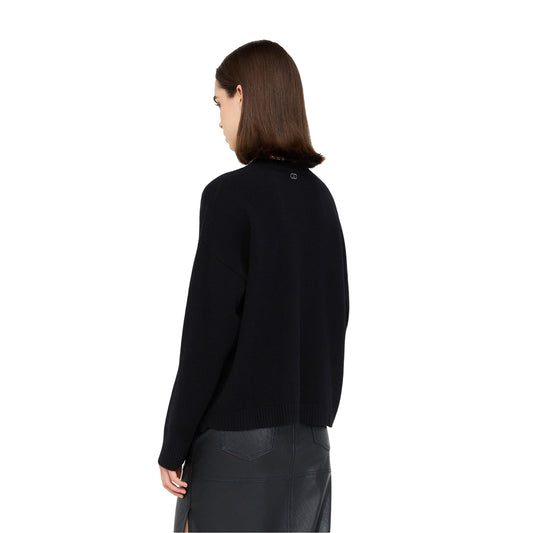 Maglia Donna in lana nera con motivo cut-out modella retro