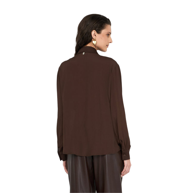 Acquista subito la Camicia Donna, realizzata in morbido tessuto, maniche lunghe, inserti in raso ton sur ton, firmata Liu Jo su Martini 900: vieni a scoprire tutta la collezione sul nostro sito
