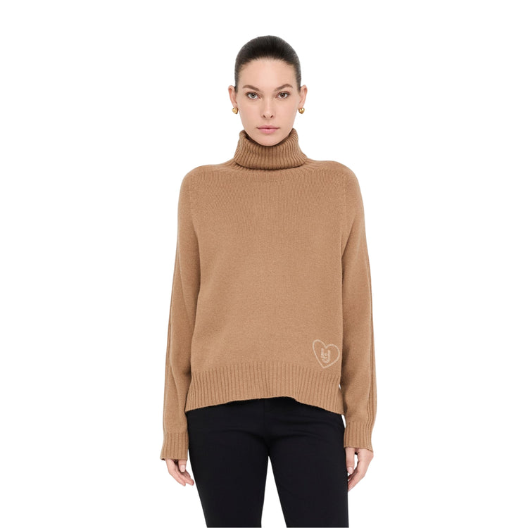 Dolcevita Donna in lana e cashmere dal fit morbido Beige modella frontale