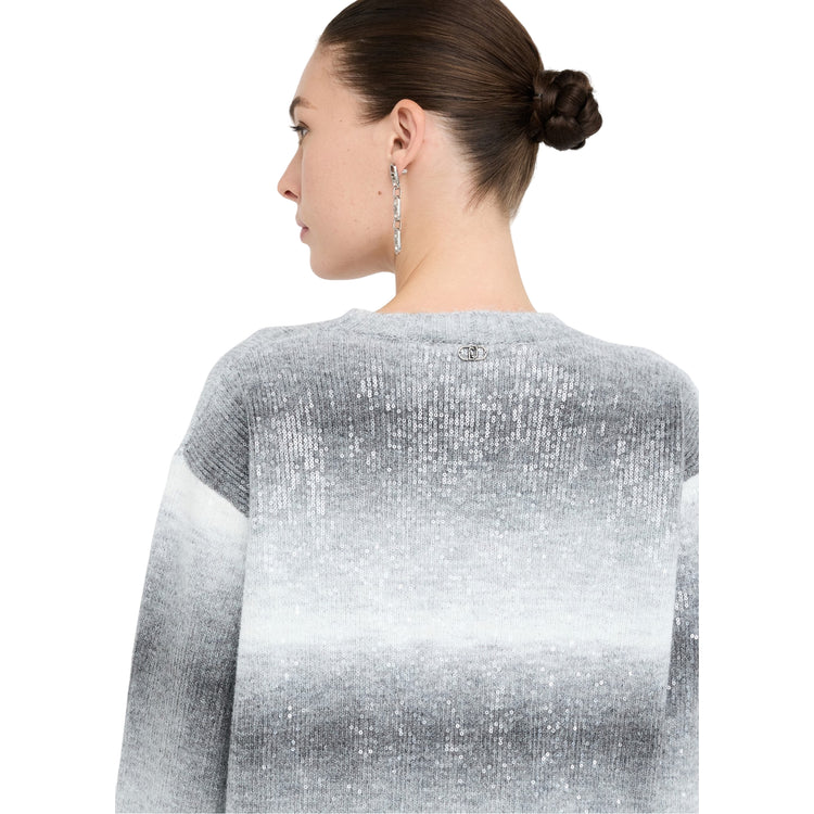 Abito corto Donna in maglia con paillettes modella retro ravvicinata