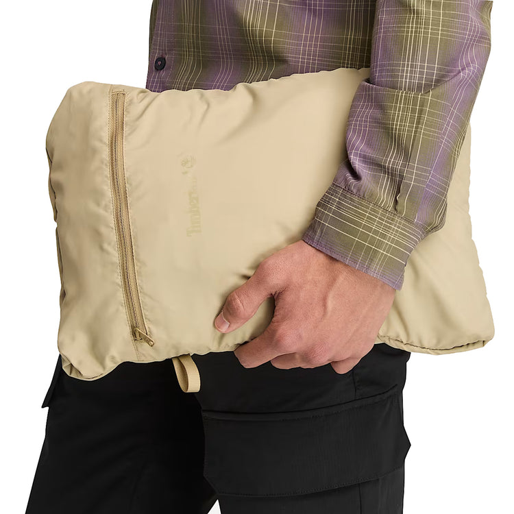 Gilet Idrorepellente Uomo Axis Peak Beige ripiegato nella sua pochette da trasporto