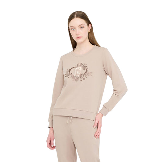 Felpa Donna beige con ricamo floreale modella frontale