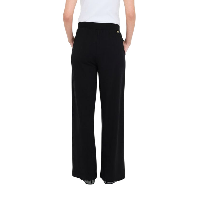 Pantaloni jogging Donna Nero modella retro