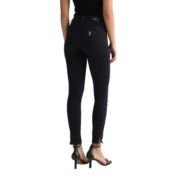 Jeans Skinny Donna con spacchetto Nero modella retro