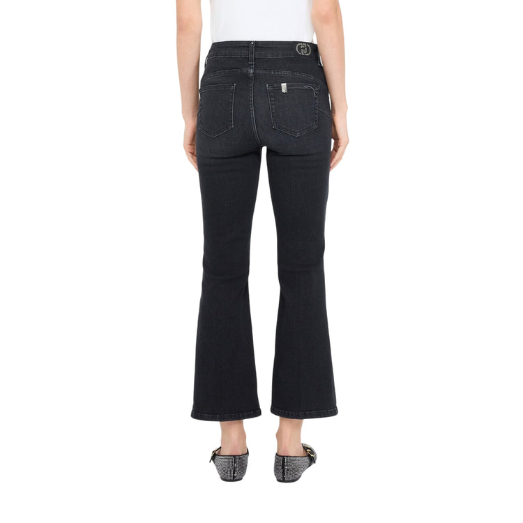 Jeans Donna flare cropped con strass Nero modella retro