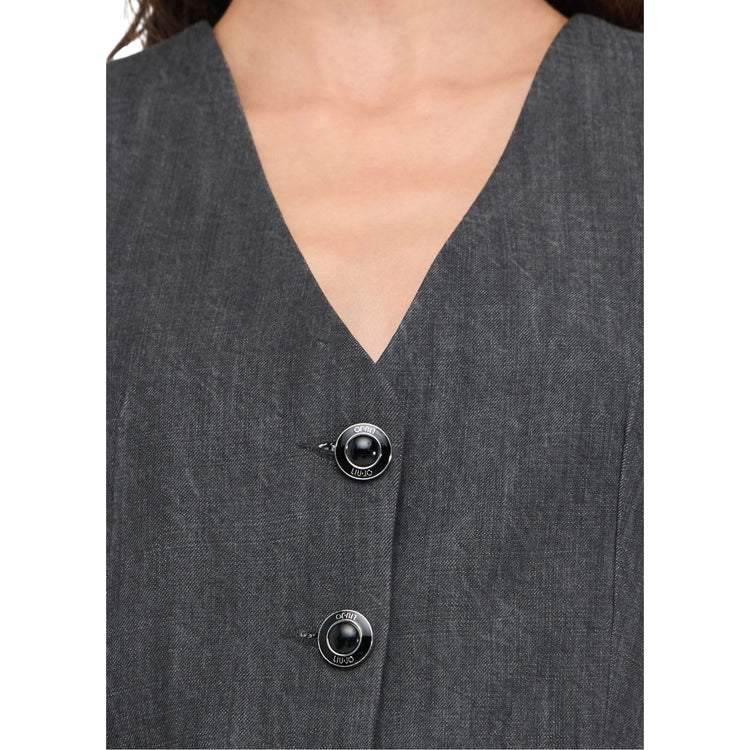 Acquista subito il Gilet donna con scollo a V, cinturino sul retro e tasche a filetto firmato Liu Jo, su Martini 900: vieni a scoprire tutta la collezione sul nostro sito