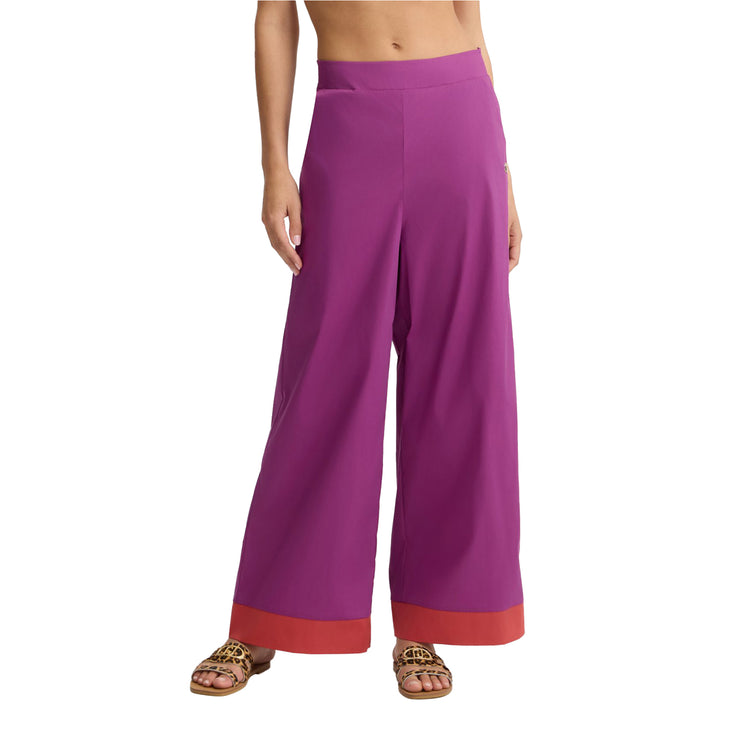 Pantaloni a palazzo da donna in cotone viola modella frontale