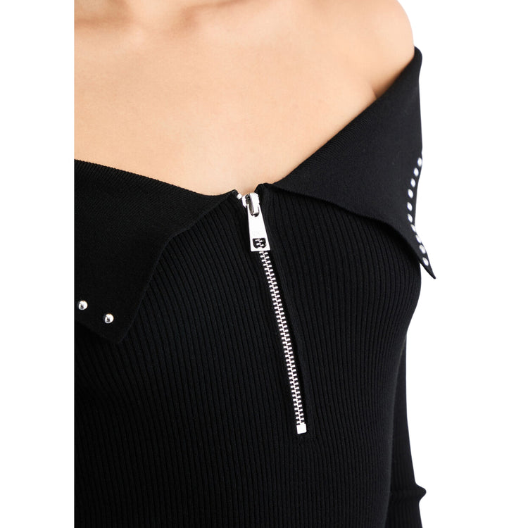 Maglia nera da donna con zip e borchie dettaglio zip
