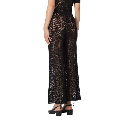 Pantaloni Donna in maglia crochet Nero modella retro