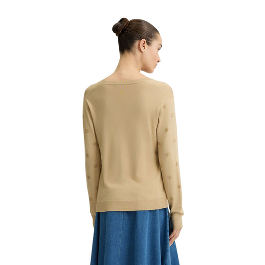 Maglia Donna con scollo a V beige con logo modella retro