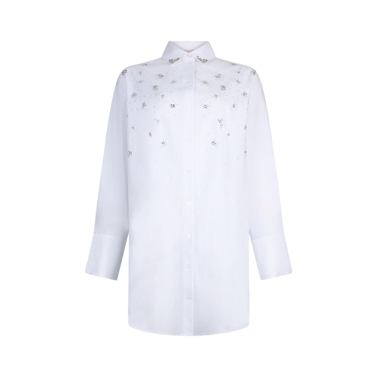 Abito bianco impreziosito con ricami gioiello