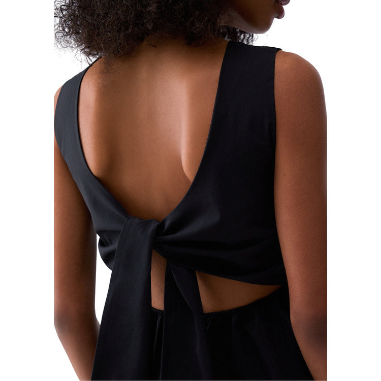 Top da donna con fiocco scoperto sulla schiena in nero