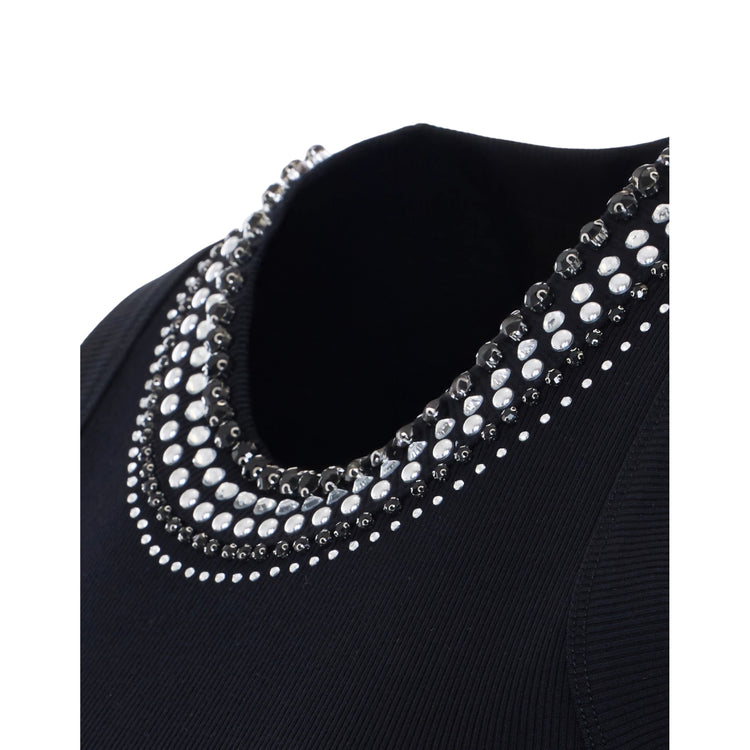 Canottiera nera con borchie bianche e nere