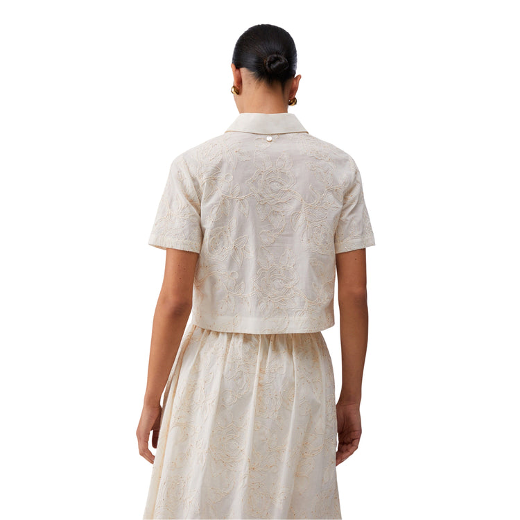 Camicia a maniche corte di cotone con ricami in bianco