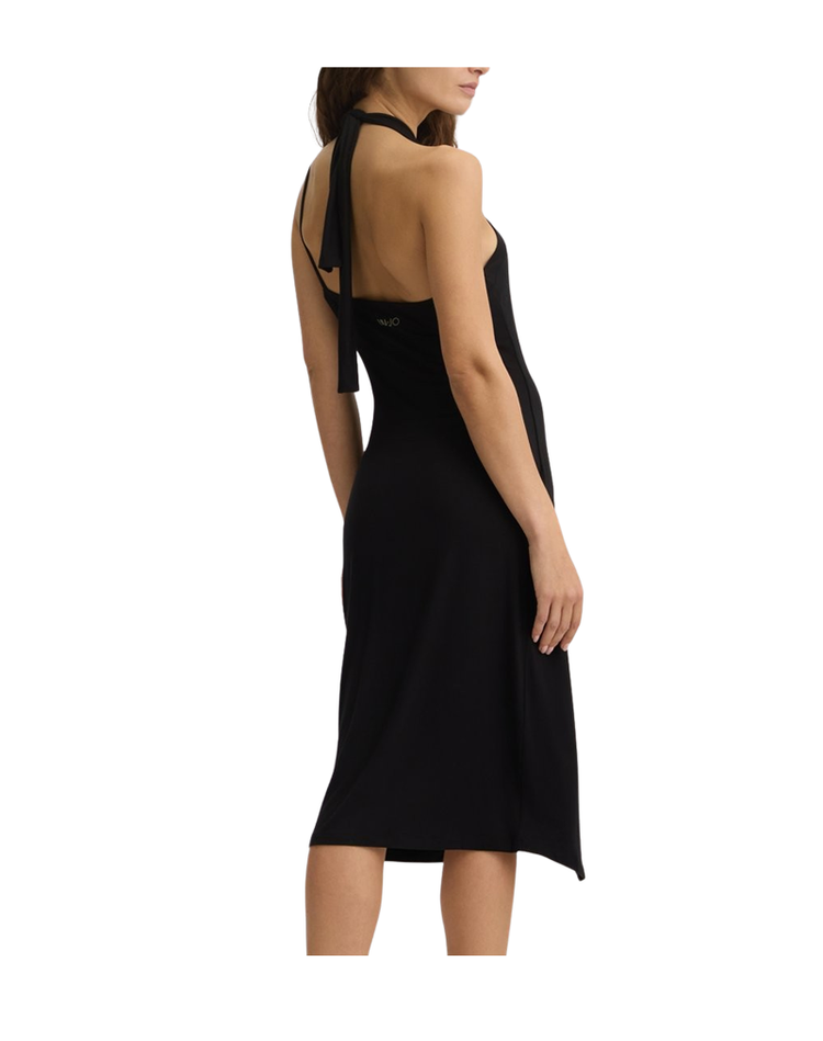 Abito Donna Nero dallo scollo asimmetrico modella retro