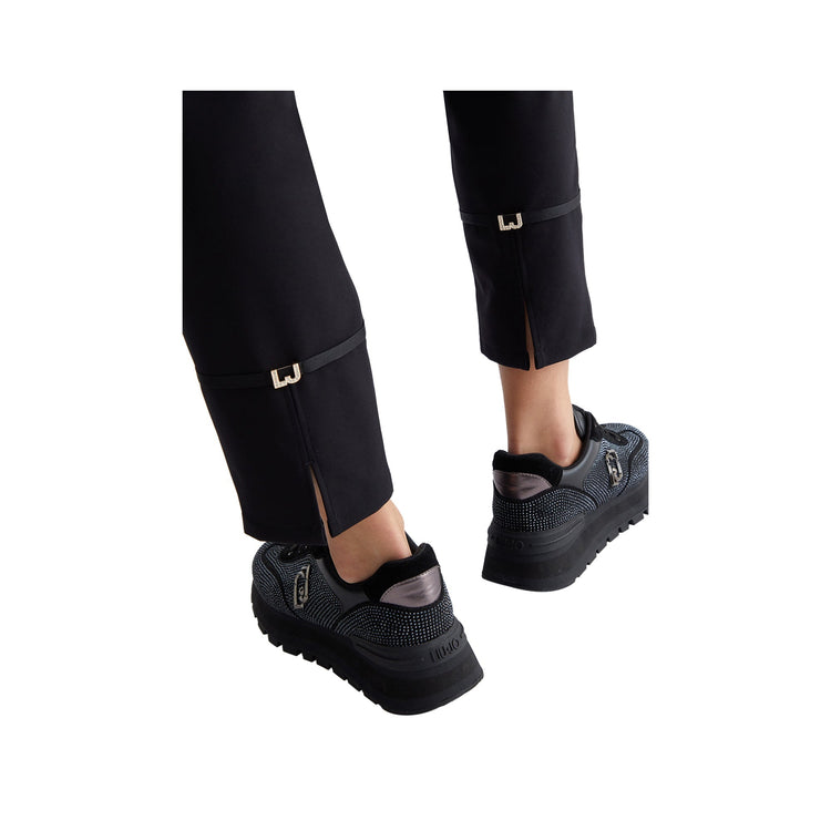 Women's trousers with logo buckles