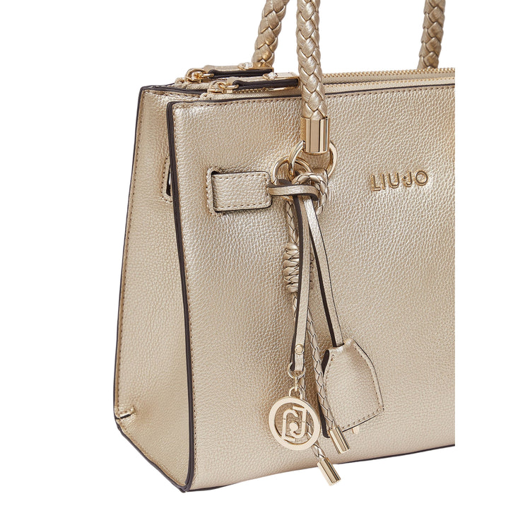 Borsa oro chiaro effetto tamburo 