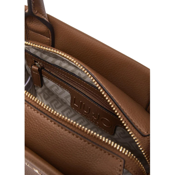 Borsa a mano marrone martellata 