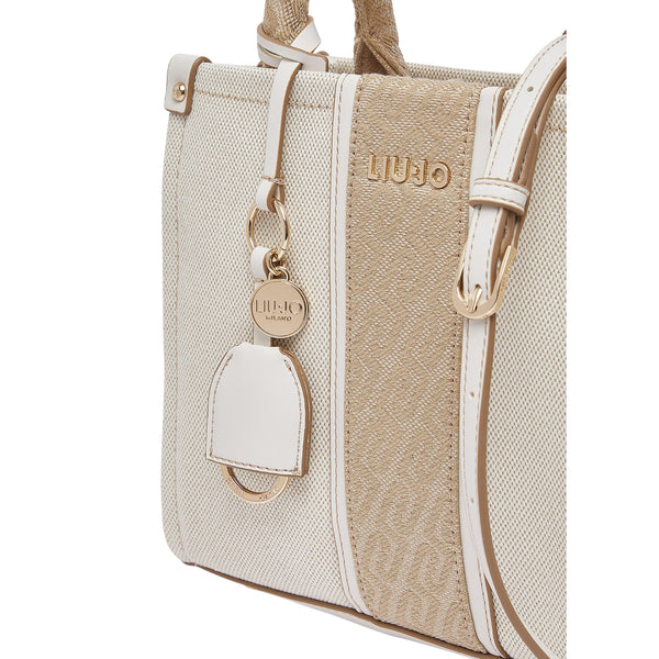 Borsa a mano con inserto jacquard e tracolla