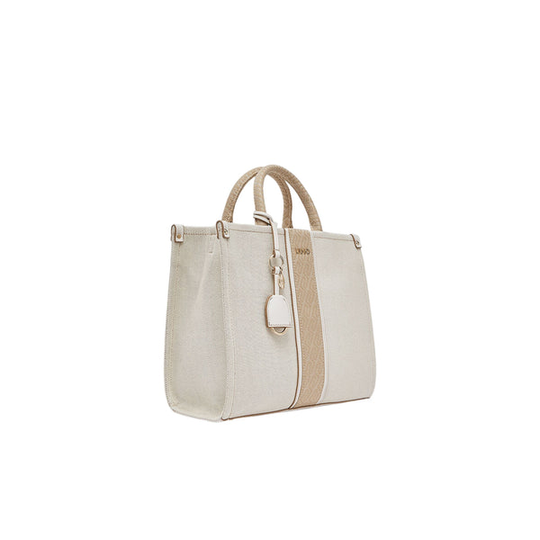 Borsa media a mano color crema e jacquard