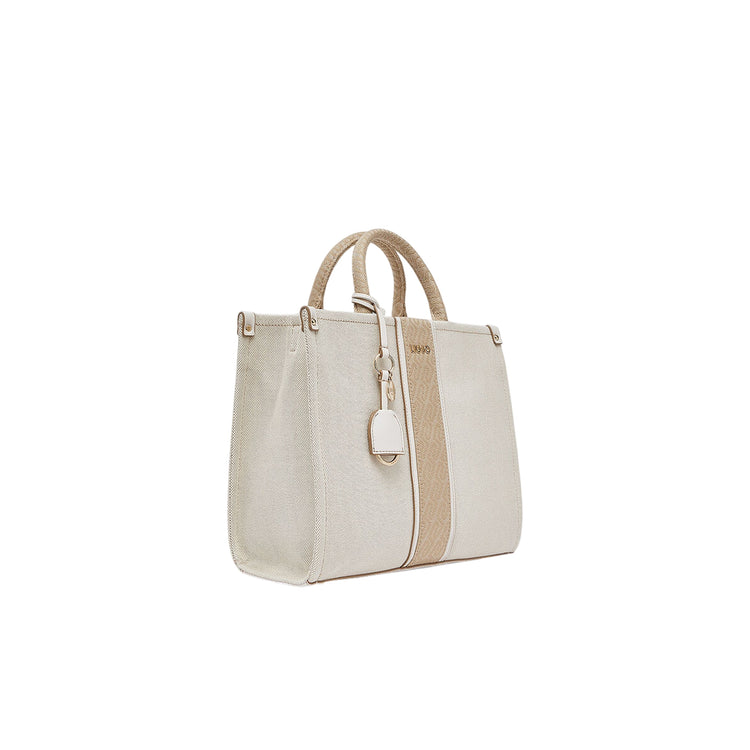 Borsa media a mano color crema e jacquard