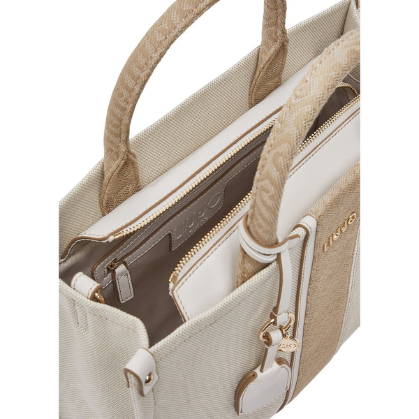 Borsa media a mano color crema e jacquard