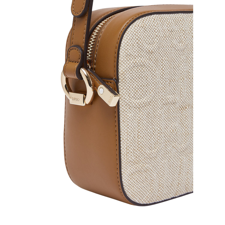 Borsa da donna a tracolla media in juta dettaglio