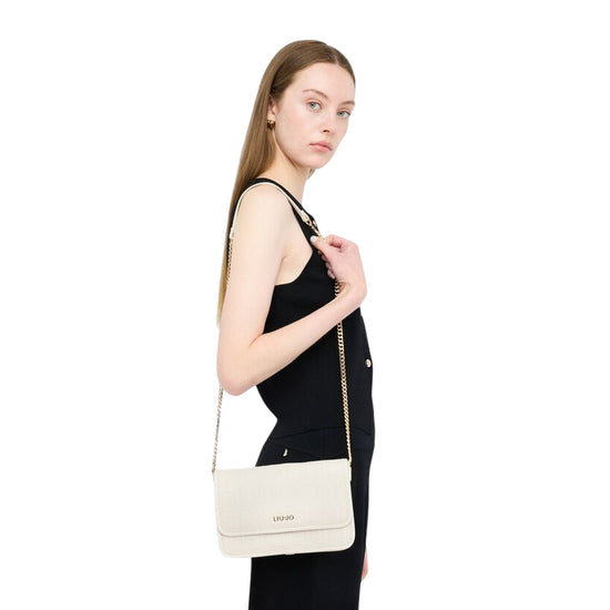Borsa a tracolla piccola con logo a rilievo Bianco su modella