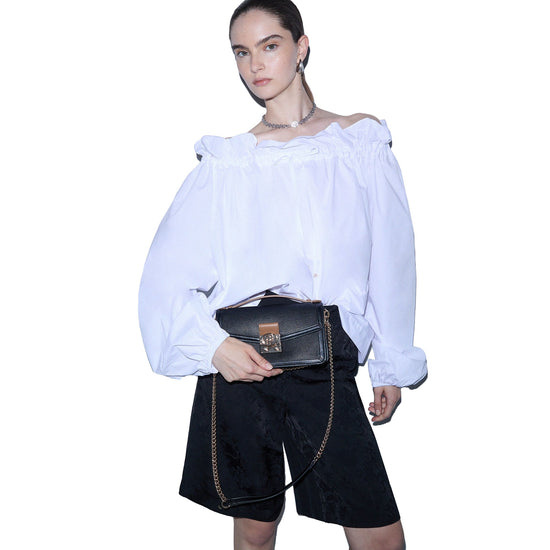 Borsa piccola Donna con tracolla catena Nero modella
