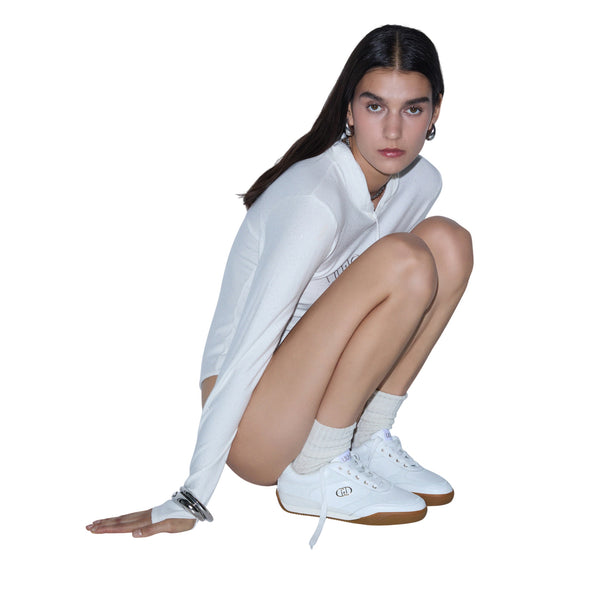Sneakers Donna dettagli effetto pitone modella