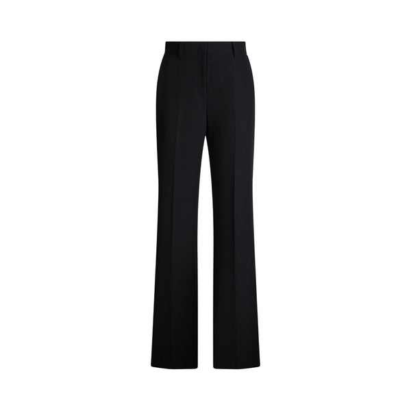 Pantalone Donna con tasche a filetto e logo metallico
