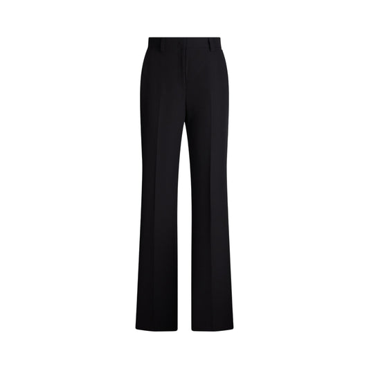 Pantalone Donna con tasche a filetto e logo metallico