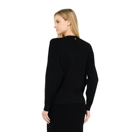 Maglia Donna in nero con castoni gioiello modella retro