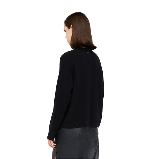 Maglia Donna in lana nera con motivo cut-out modella retro