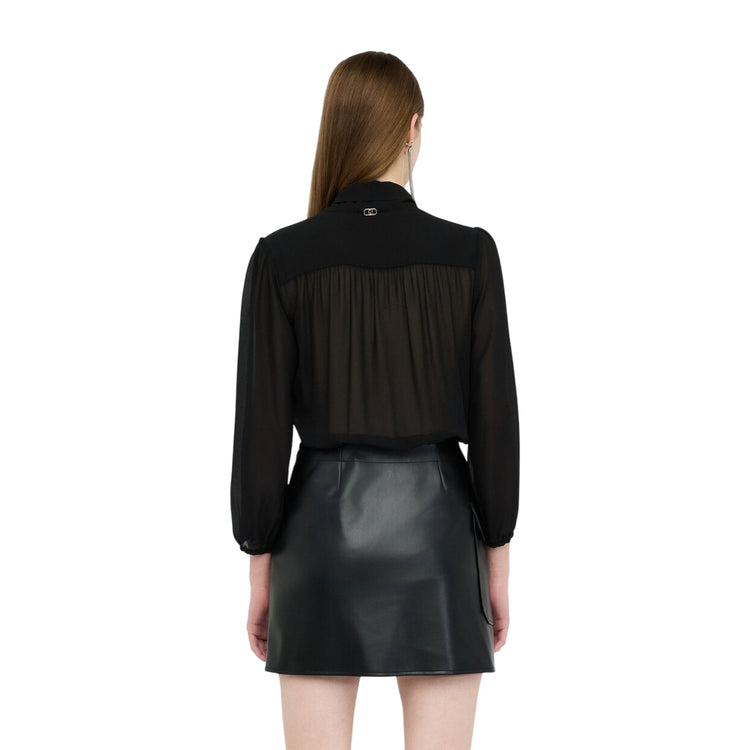 Abito Donna con gonna tessuto spalmato Nero modella retro