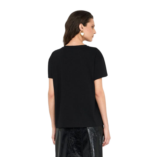T-shirt Donna con grafica pinguino con paillettes Nero modella retro